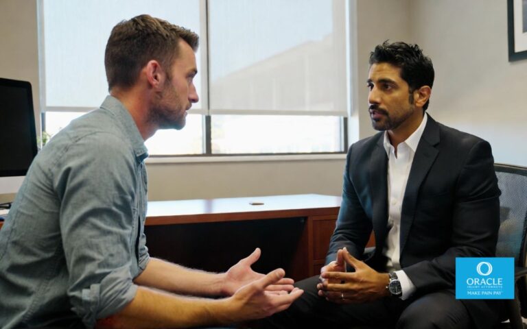 6,7s Compassionate personal injury attorney listening to an injured client explain an accident, calm professional office setting, reassuring conversation, bright modern office interior