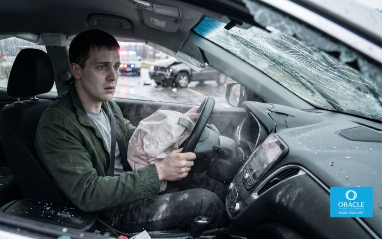 A driver sitting inside a damaged car looking shaken, airbags deployed, realistic accident scene, natural lighting, high detail