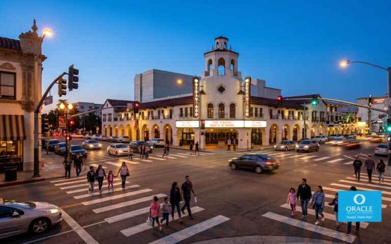 A busy downtown Riverside street intersection at dusk, pedestrians crossing, warm street lights, cinematic editorial photography, slight motion blur on passing cars, no text