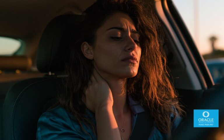 A person sitting in a car after an accident, looking distressed and holding their neck, golden hour lighting, cinematic editorial style, shallow depth of field, no text