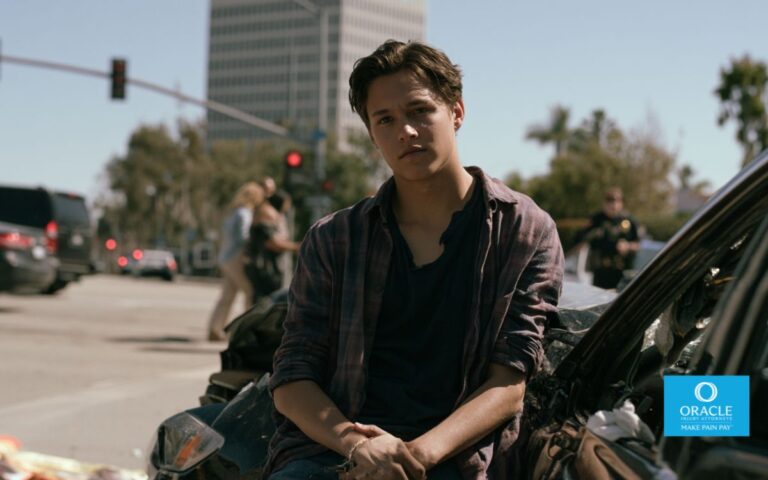 Photorealistic teenage driver standing beside a damaged vehicle after a collision at a busy Anaheim intersection, concerned parents arriving at the scene, emergency responders nearby, realistic Southern California setting, cinematic lighting, ultra-detailed, documentary photography