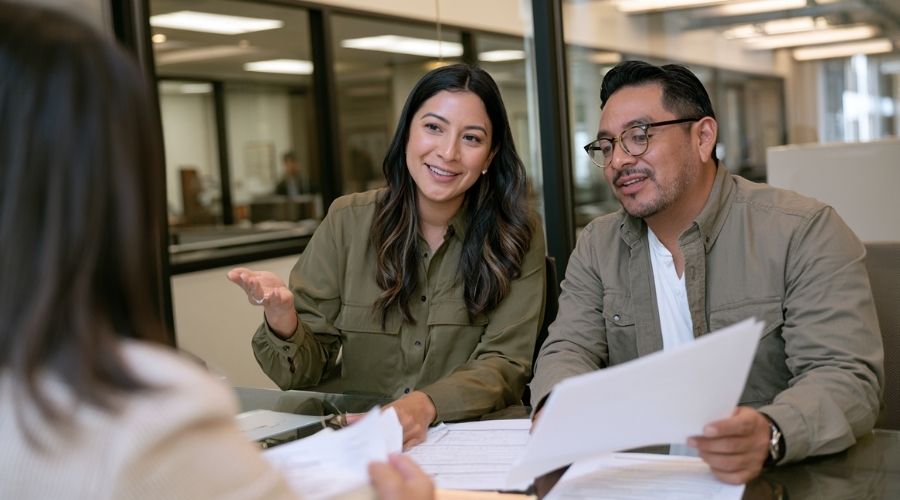 Undocumented Workers Workers Comp California: Workplace Injury Rights 2 Undocumented worker discussing California workers' compensation rights with an attorney